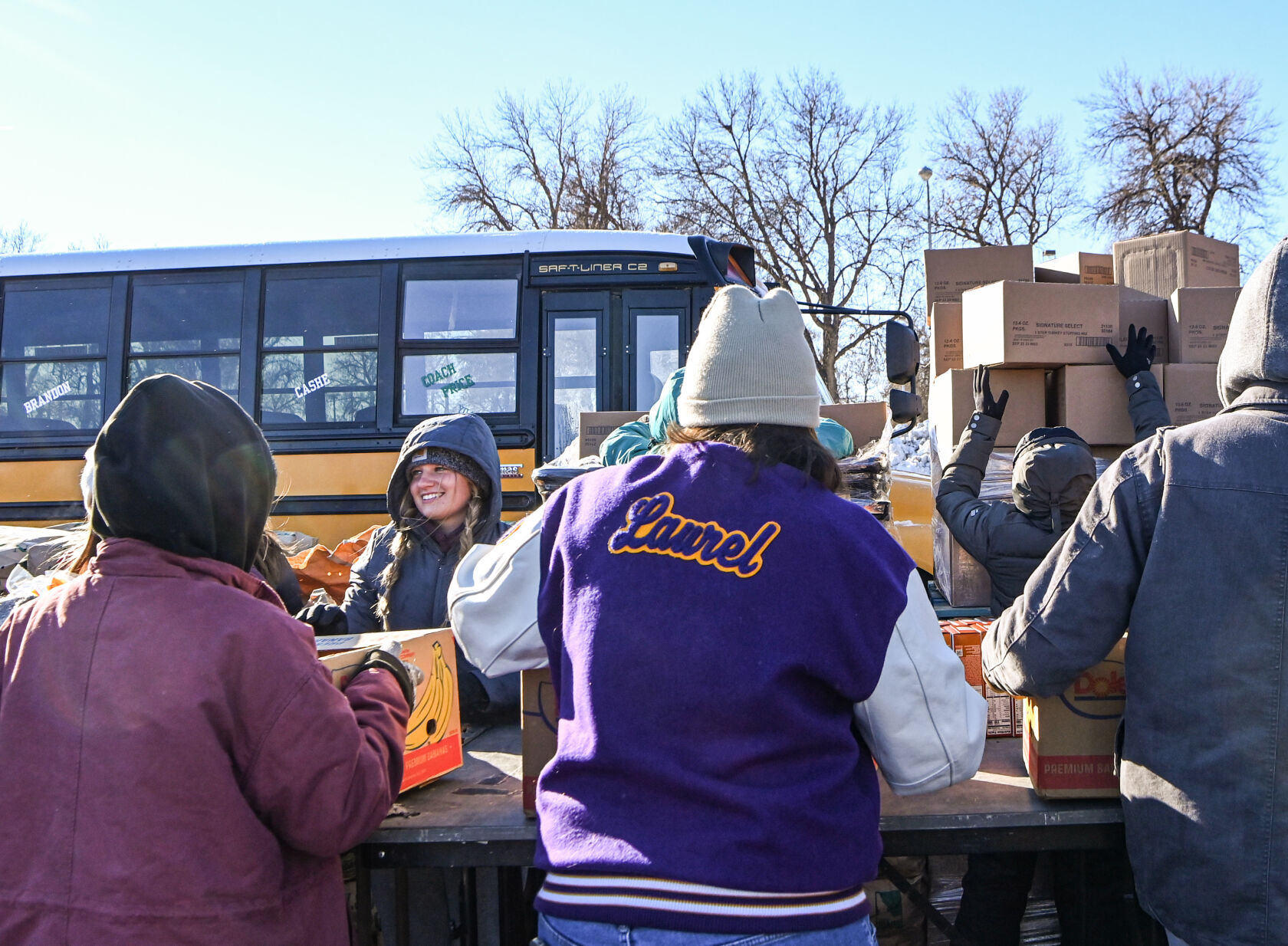 Students and volunteers gather to fill boxes for Flakesgiving